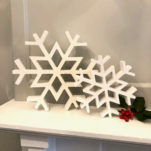 Pair Of White Wooden Snowflakes